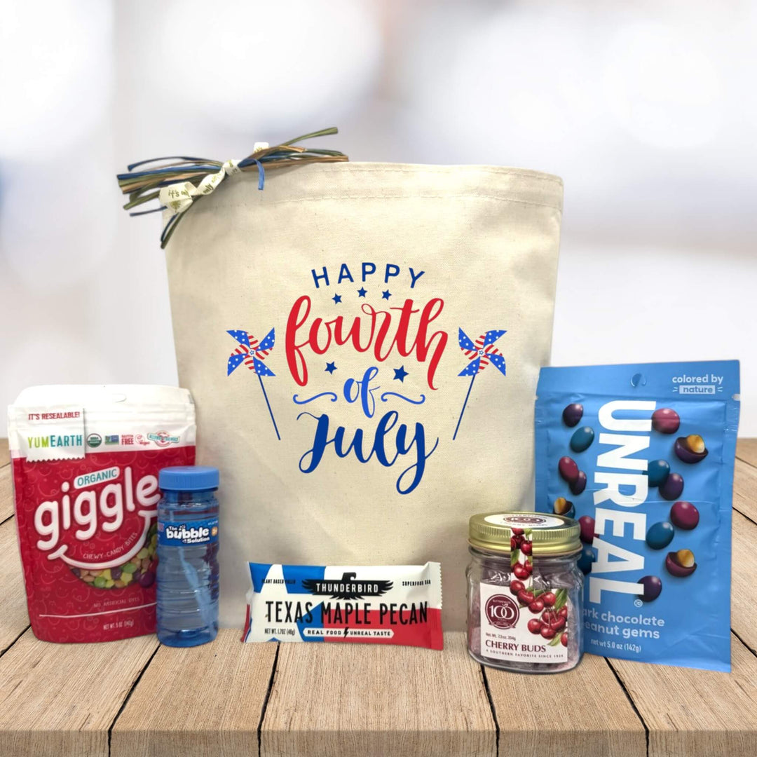 red and blue happy fourth of july with red and blue snacks and bubbles