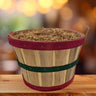 Large holiday theme apple bushel sitting on a table