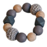 teething ring for babies made of wood and knitted beads