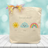 A Forecast ahead baby inspired image, with a sun, cloud, and rainbow saying eat, sleep, poop. Printed on canvas tote bag placed on wooden table with blue blurred background 