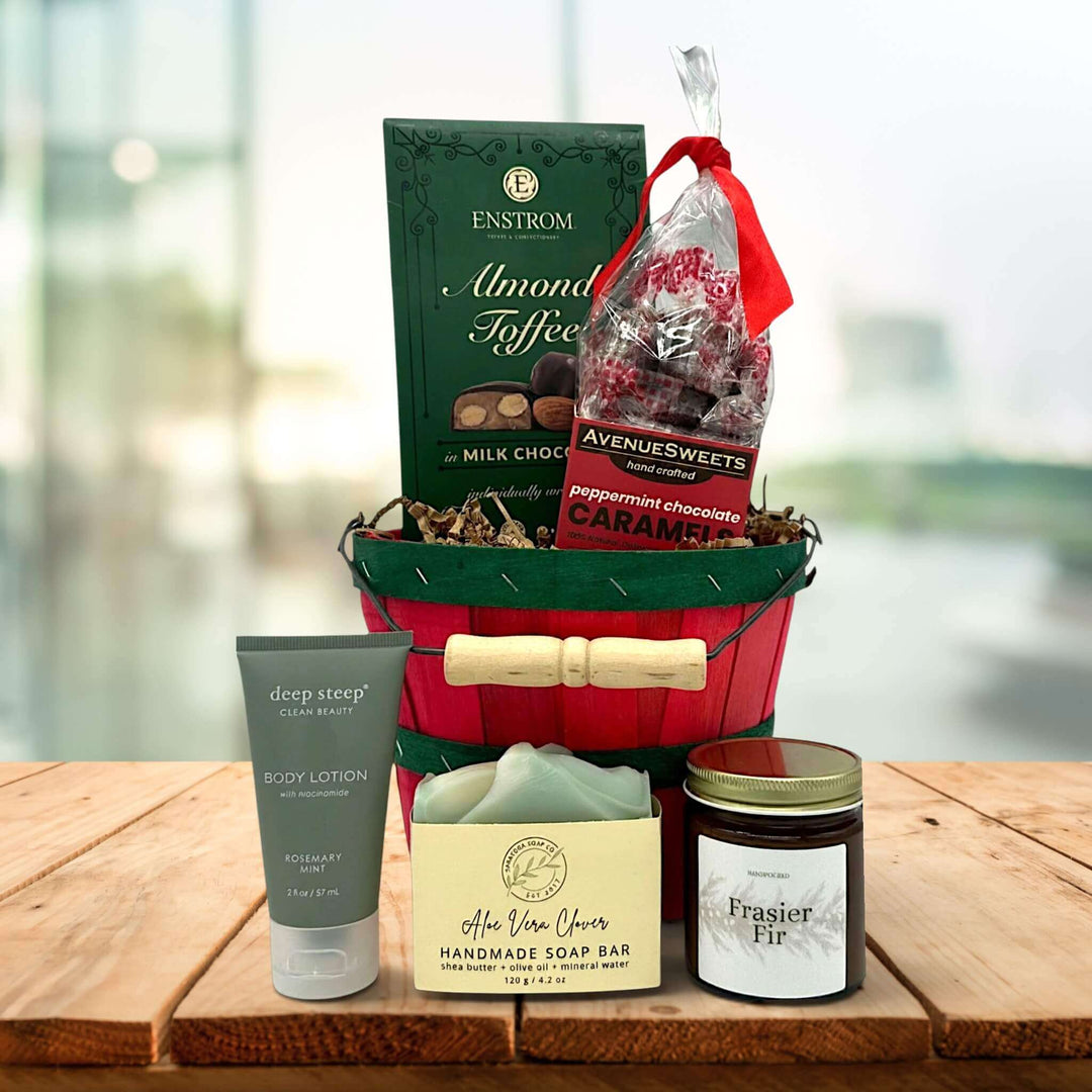 mini holiday apple bushel with almond toffee, peppermint caramels, lotion, soap and a candle