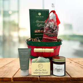 mini holiday apple bushel with almond toffee, peppermint caramels, lotion, soap and a candle