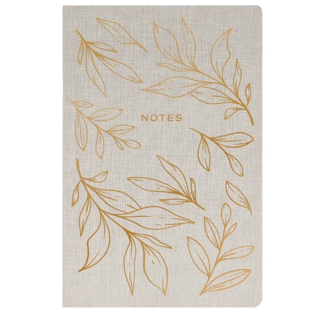 fabric journal notebook with gold leaves on the cover