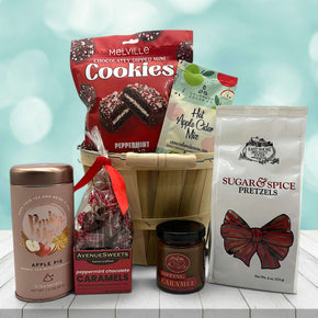 apple bushel basket with cookies, pretzels, tea, caramels and applie cider mix