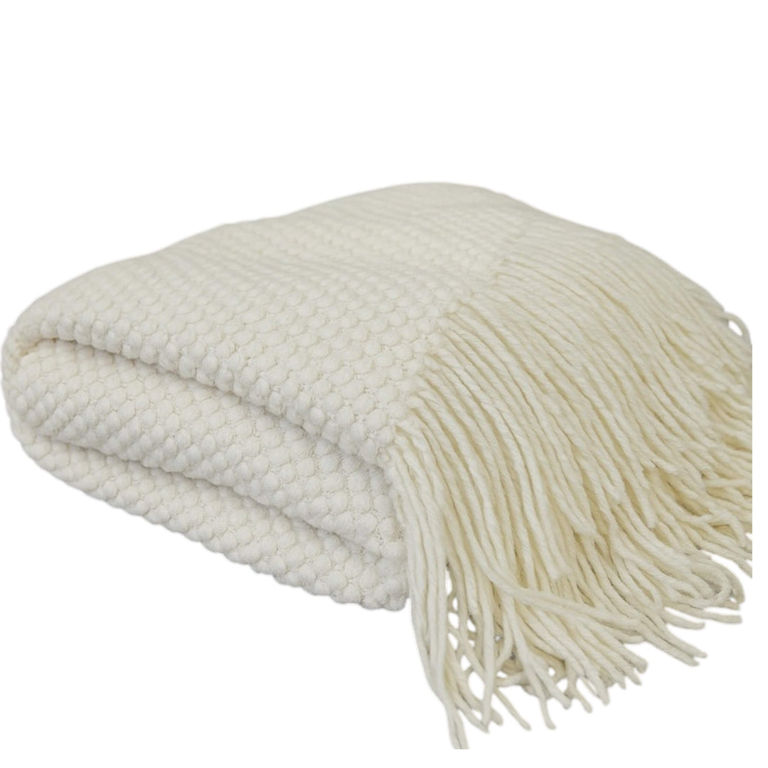 Ivory knitted blanket with fringe