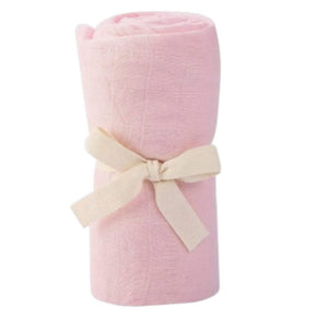 baby blanket in pick wrapped in ribbon
