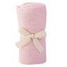 baby blanket in pick wrapped in ribbon