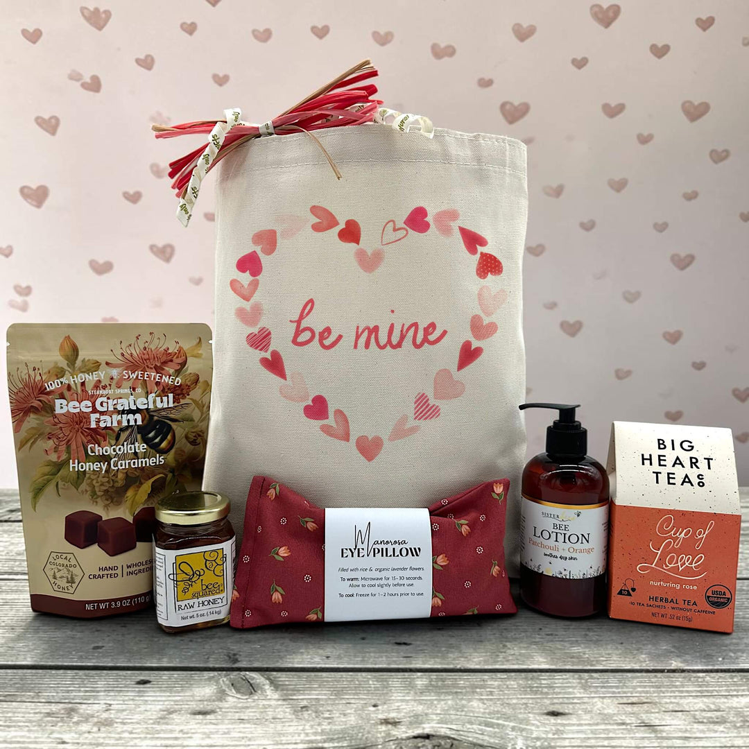 valentine gift with caramels, honey, an eye pillow, lotion and tea