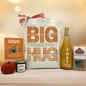 gourmet thanksgiving gift with cookies, decor pumpkin, pumpkin candle, sparking juice and caramels