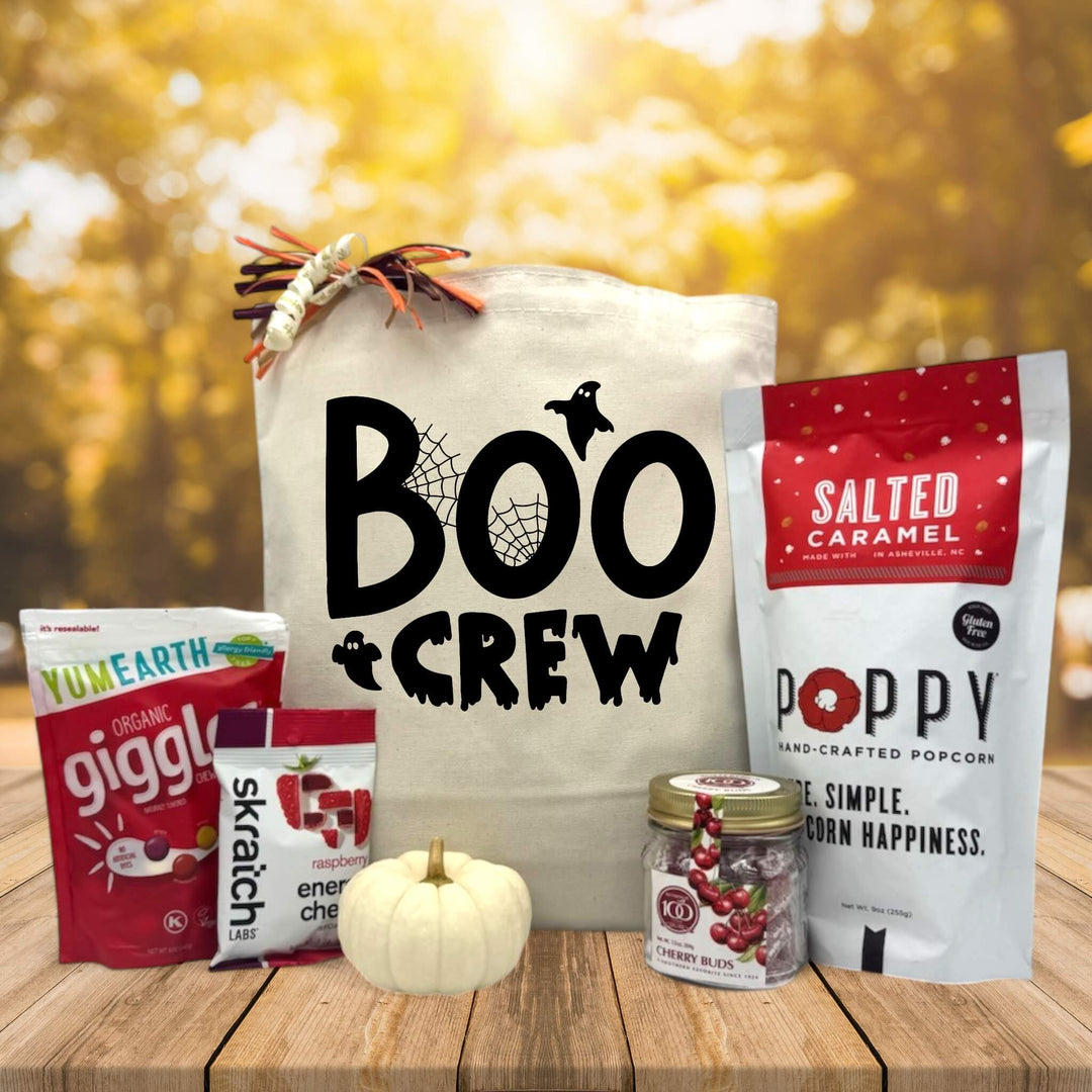 boo crew gift basket with candies, energy chews, a knit pumpkin, cherry buds, and salted caramel popcorn