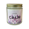 purple background with lavender  and the word calm printed on a candle