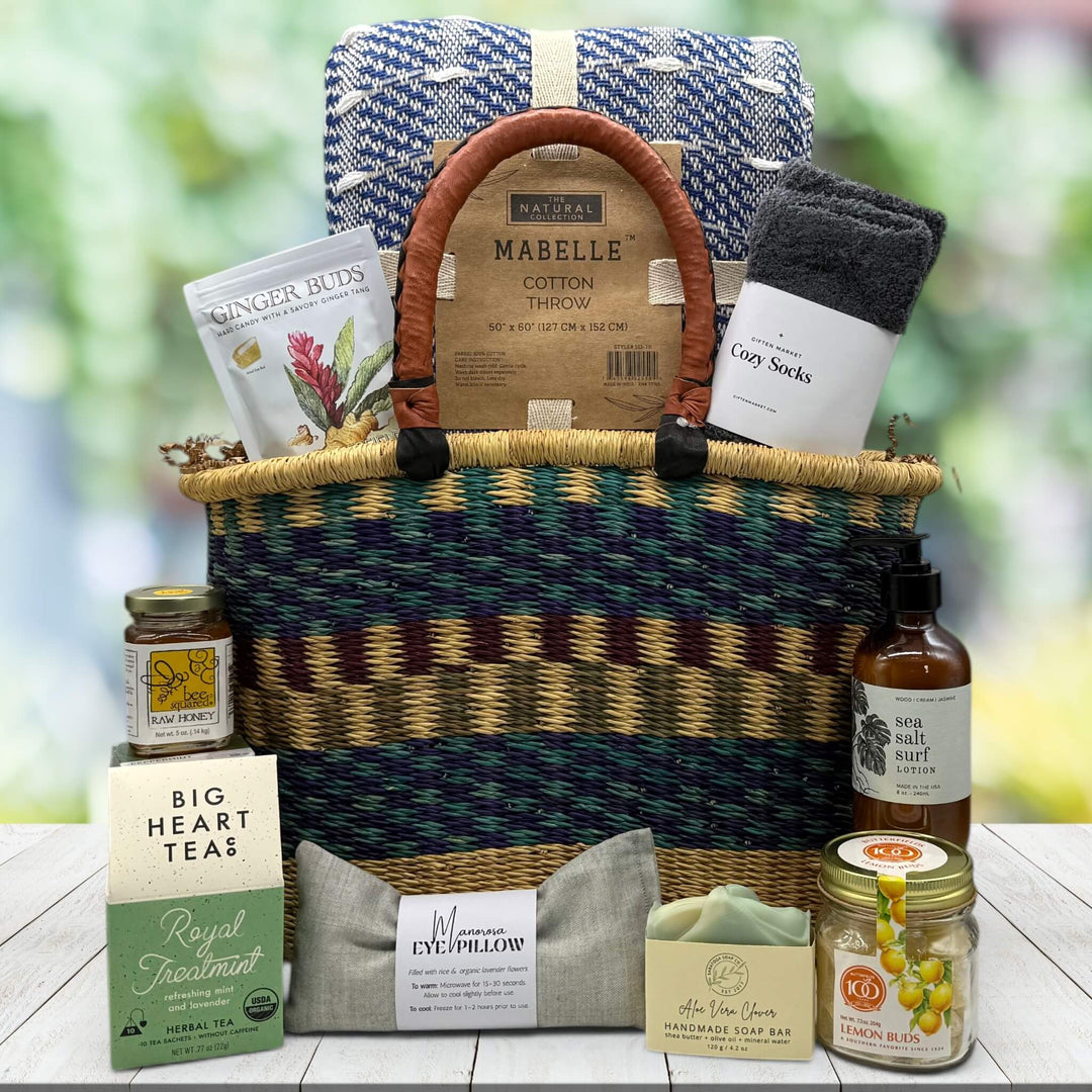 African Market basket filled with a variety of treats and spa products sitting on a table