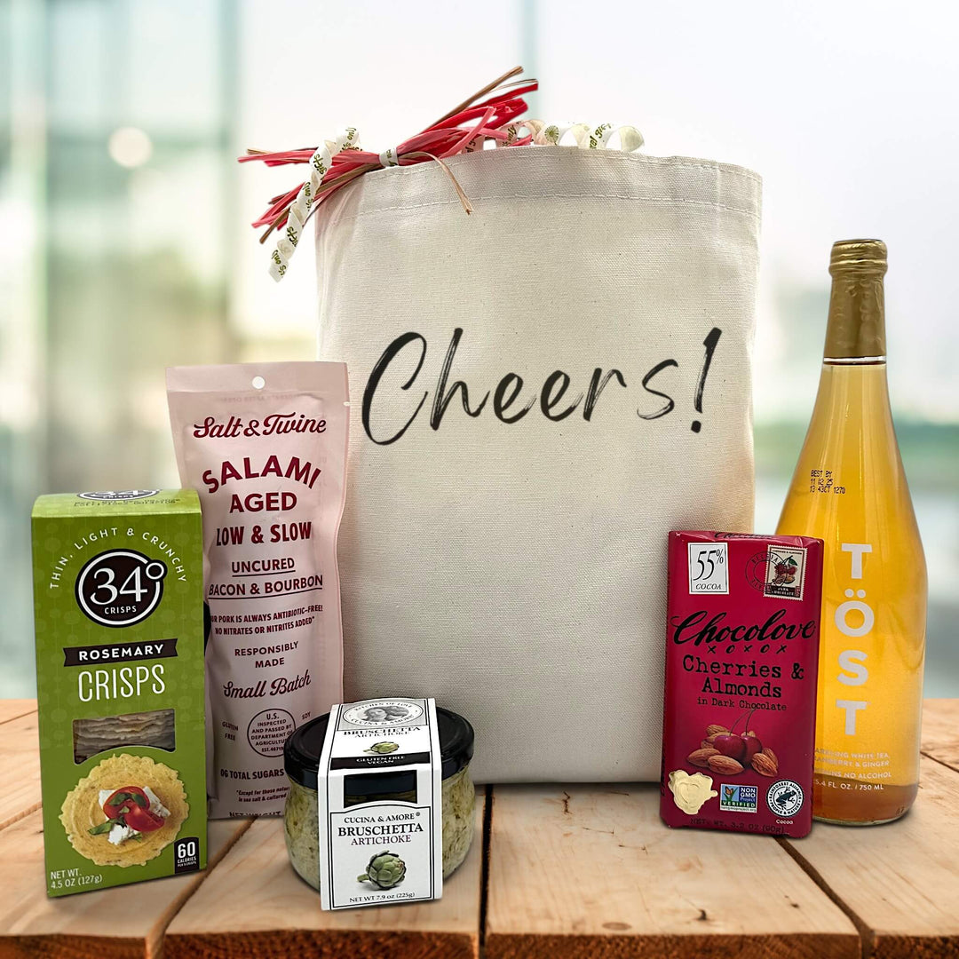 new years cheers gift basket with crackers, salami, bruschetta, chocolate bar, and sparkling juice