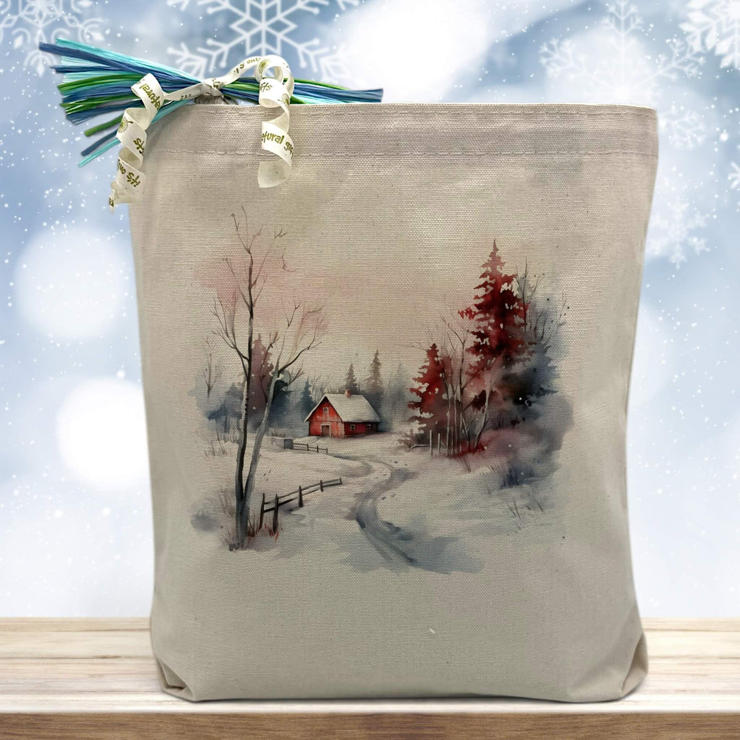 colorado winter themed cozy cabin image printed on a canvas tote bag sitting on a table
