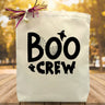 boo crew printed in black on a canvas tote bag sitting on a table