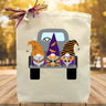 Halloween theme gnomes printed in a canvas tote bag sitting on a table