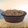 handwoven deep tray african market tray sitting on a table with a blurred background