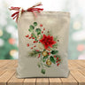 holiday floral bouquet printed on a canvas tote bag sitting on a wood table with a blurred holiday background