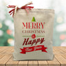 merry christmas and happy new year printed in red and green on a canvas tote bag sitting on a wood table