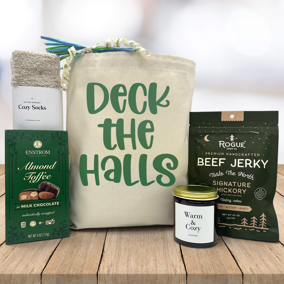 gourmet holiday gift basket with socks, almond toffee, a warm and cozy candle and beef jerky