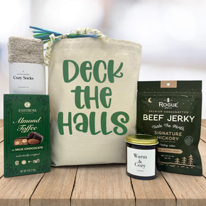 gourmet holiday gift basket with socks, almond toffee, a warm and cozy candle and beef jerky