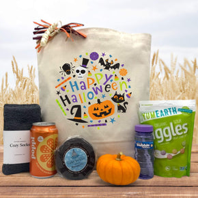 Halloween gift basket with socks, poppi, whoopie pie, knit pumpkin, bubbles and candies