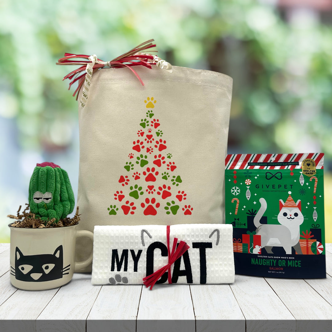 gourmet holiday cat gift basket with a cat nip cat toy, a cat mug, a cat themed dishtowel and cat treats