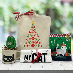 gourmet holiday cat gift basket with a cat nip cat toy, a cat mug, a cat themed dishtowel and cat treats