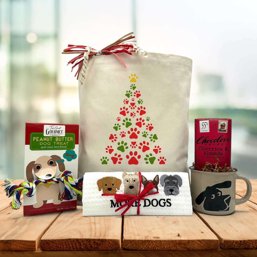Gourmet holiday dog gift basket with dog treats, dog distowel, dog mug and a chocolate bar