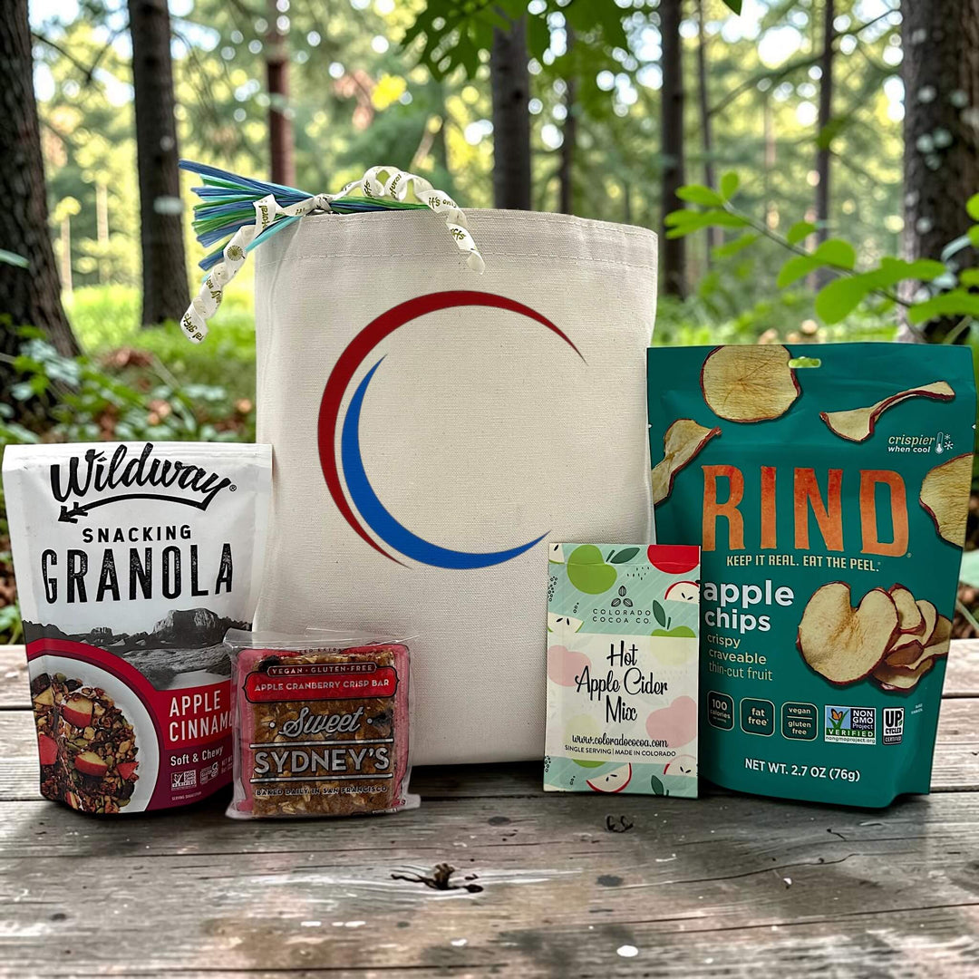 gluten free corporate gift with granola, a cranberry bar, apple cider mix, and apple chips