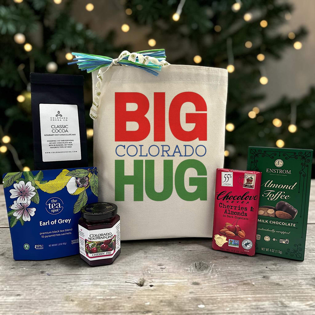 Gourmet colorado holiday gift with cocoa, tea, jam, chocolate bar, and almond toffee