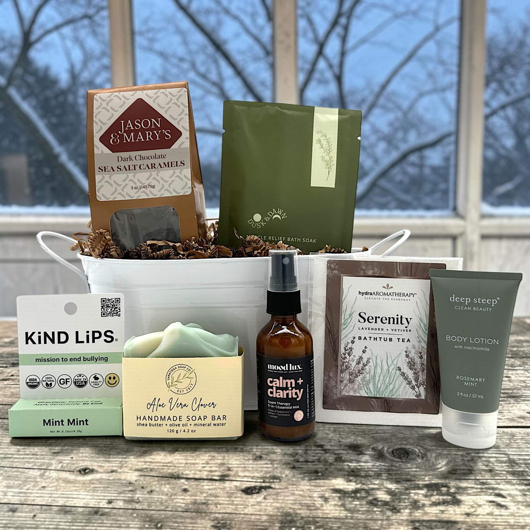 Gourmet spa gift basket with caramels, bath salts, chaptstick, soap, lotion, and more
