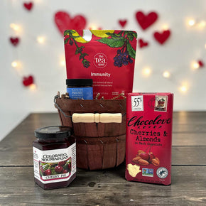 mini bushel with jam, honey, tea and a chocolate bar
