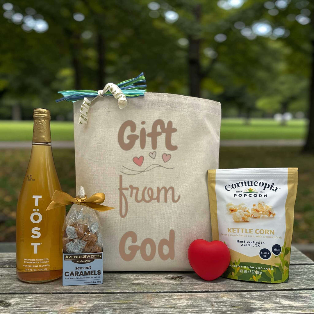 tote bag, tost, caramels, heart squeeze, and kettle corn sitting on a table