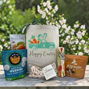 Easter Gift Basket with Peach Buds, Mexican wedding cookies, a lavedner eye pillow, a kitchen dishtowel and trail mix