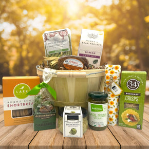 Gourmet apple bushel with pasta, pesto, soup, cookies, caramels, crackers, bruschetta, and more snacks