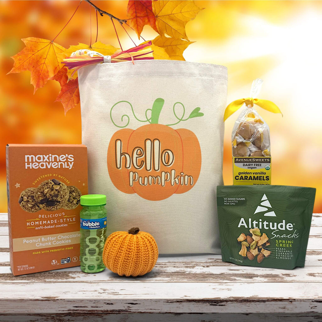 Gourmet Fall gift basket with peanut butter cookies, bubbles, a knit pumpkin, trailmix and caramels