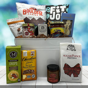 Deluxe gourmet holiday gift basket with chips, pretzels, chocolates, crackers, pretzels, caramels, peanuts, salsa, bruschette