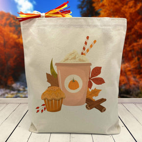fall latte print on canvas tote bag sitting on a table with a fall background