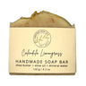 yellow handmade soap with lemon flakes on top
