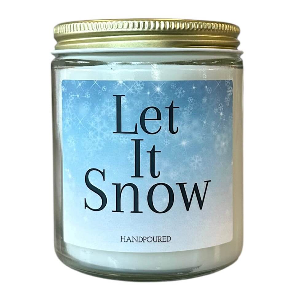 let it snow with blue snowflakes printed on large candle