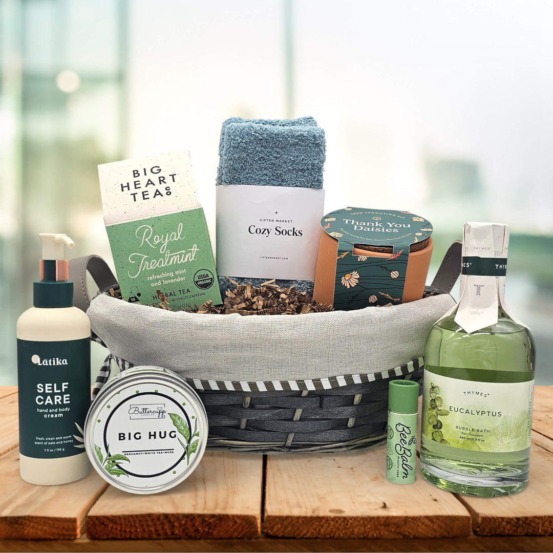 Gourmet nurses gift with tea, socks, a plant grow kit, lotion, a candle, chapstick, and bubble bath