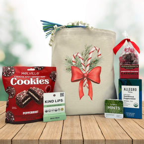 Gourmet holiday gift basket with peppermint cookies, mint kind lips chapstick, peppermint mints, peppermint tea, and peppermint chocolate caramels
