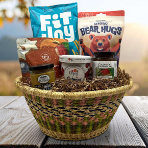 Gourmet gift basket with pretzels, taffy, tea, oatmeal , jam and mustard