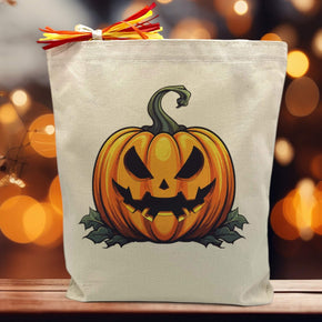 Halloween pumpkin printed on a canvas tote bag sitting on a table