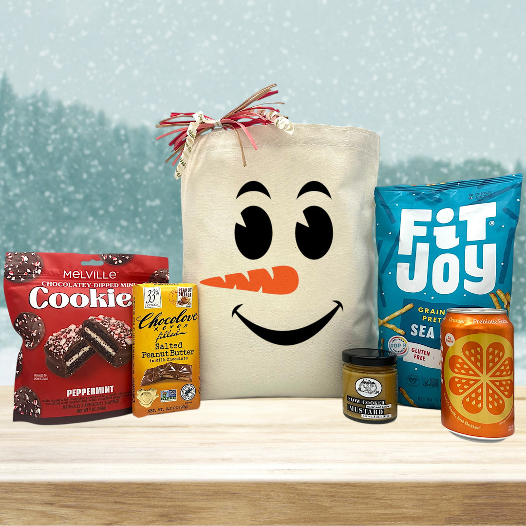 Gourmet winter gift basket with cookies, chocolate bar, pretzels and mustard and a poppi drink