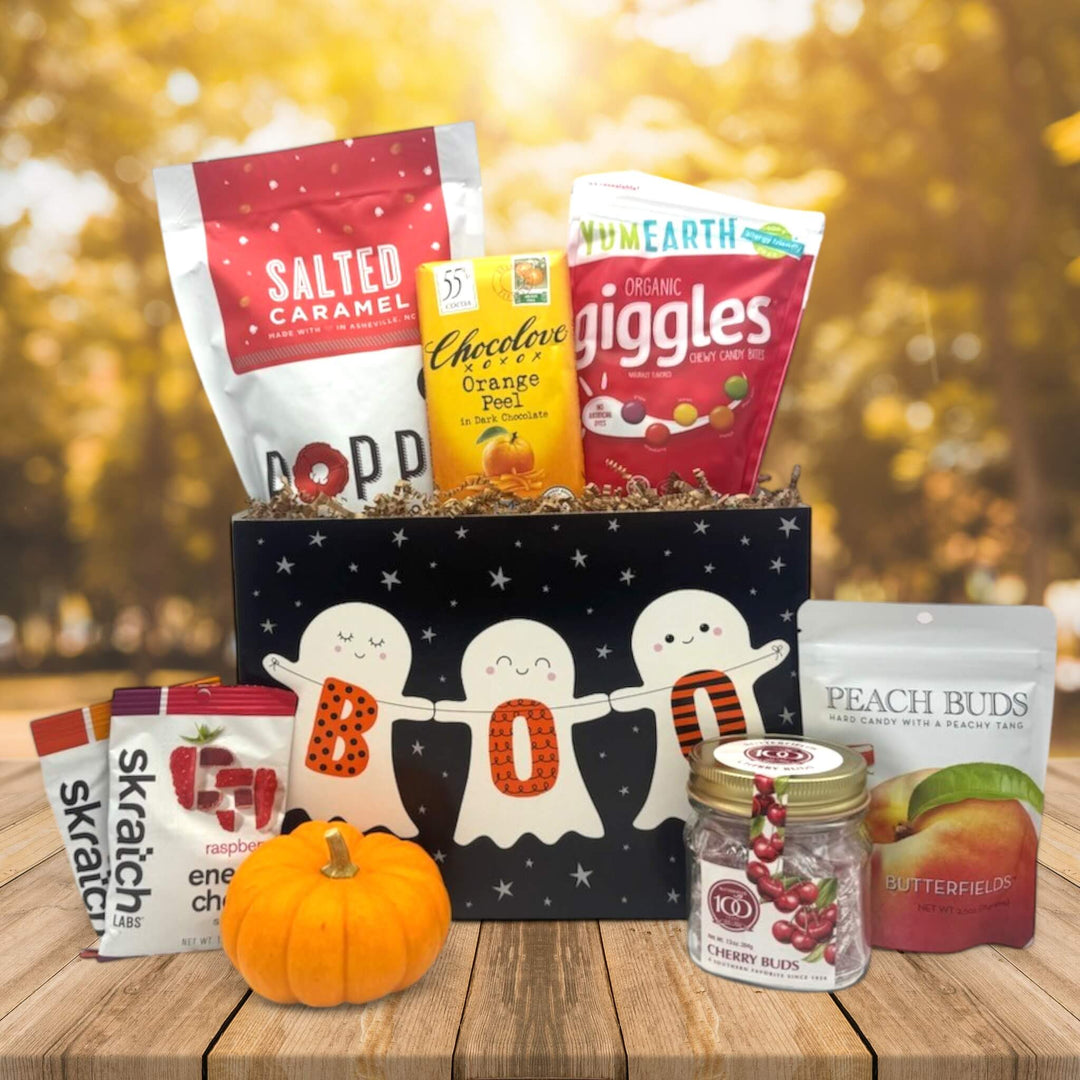 Halloween Boo gift basket with popcorn, chocolate, candies, energy chews, knit pump, cherry jar, and peach buds