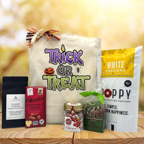trick or treat gift basket with cocoa, chocolate, cherry buds, caramels and popcorn