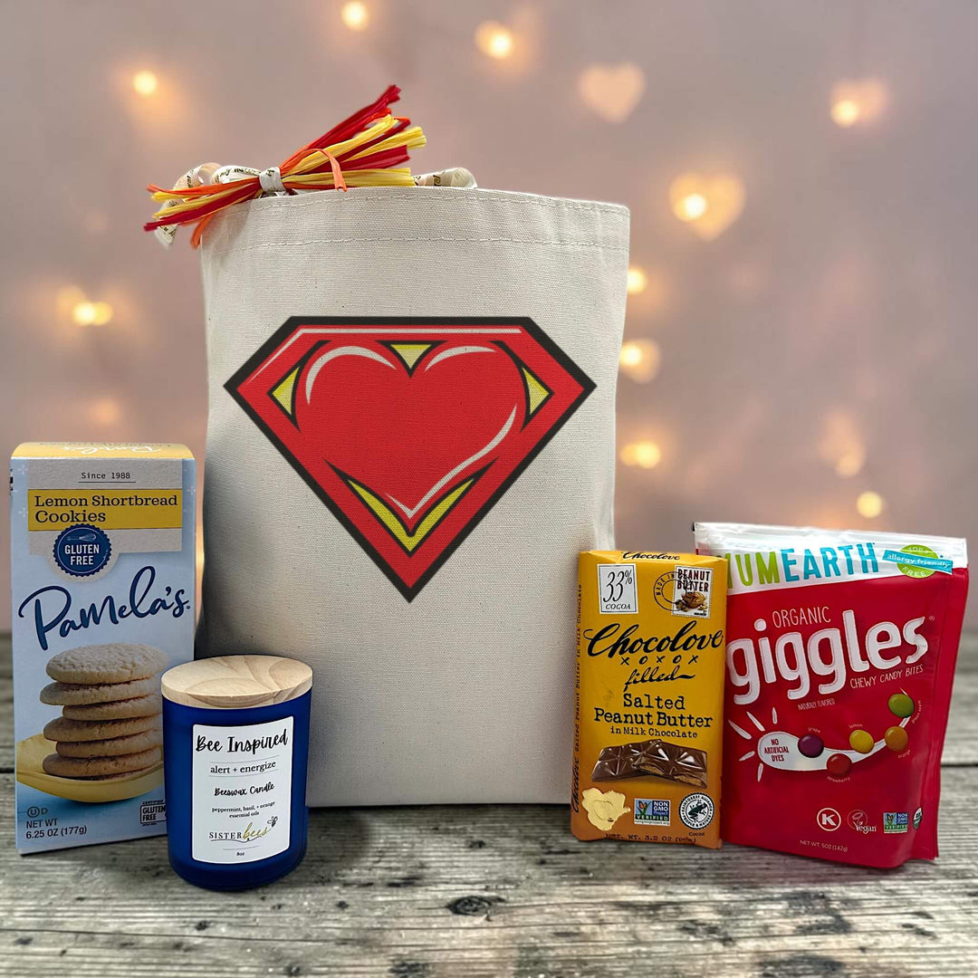 valentine gift with cookies, candle, chocoalate bar, and chewy fruity candies