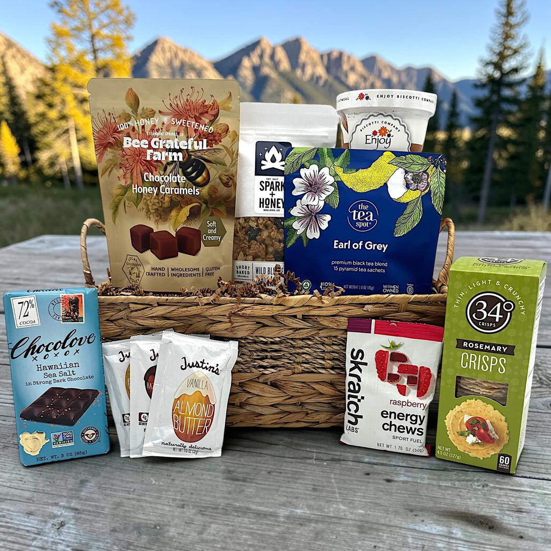 Gourmet Colorado gift basket with caramels, granola, oatmeal, tea, chocolate bar, peanut butter, energy chews and crackers